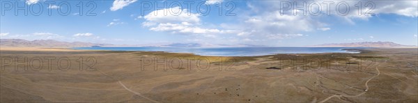 Aerial view, Vast empty landscape at the mountain lake Song Kul in autumn, Moldo Too Mountains, Naryn region, Kyrgyzstan, Asia