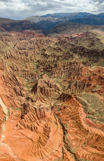 Badlands, gorges and mountains, eroded red sandstone cliffs, Konorchek Canyon, Boom Gorge, aerial view, Kyrgyzstan, Asia