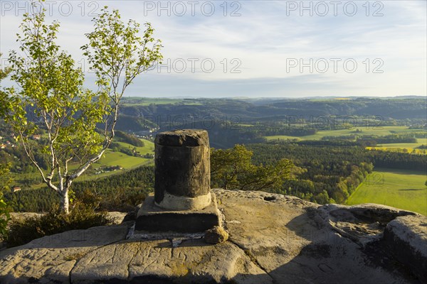 The Lilienstein is the most striking and best-known rock in the Elbe Sandstone Mountains. Remnant of the triangulation column from 1865, Ebenheit, Saxony, Germany, Europe