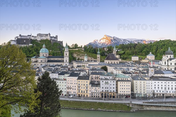 View of the fortress Hohen Salzburg with old town and Untersberg, blue sky, Salzburg, Austria, Europe