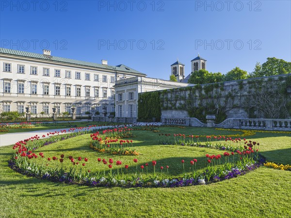 Mirabelle plum palace with flowers in the foreground, Mirabelle gardens, blue sky, Salzburg, Austria, Europe