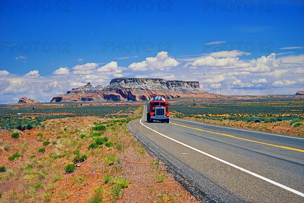 Red truck comes from Monument Valley, part of Navajo National Monument, Navajo Nation Reservation, Arizona, USA, North America