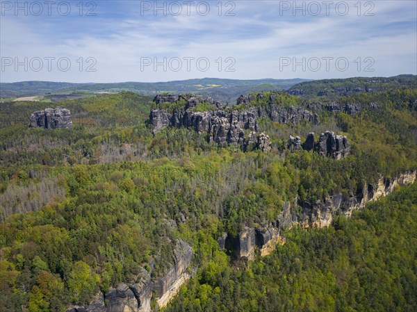 The Schrammsteine are an elongated, heavily jagged group of rocks in the Elbe Sandstone Mountains, located east of Bad Schandau in Saxon Switzerland, Reinhardtsdorf, Saxony, Germany, Europe