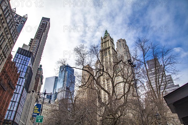 Thomas Paine Park and the historic skyscrapers of Lower Manhattan, New York City