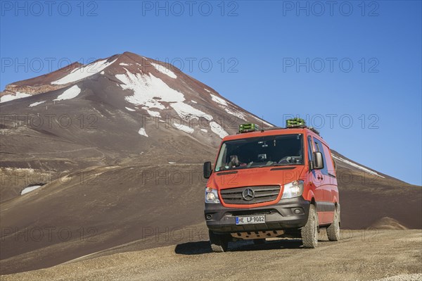 Campervan in front of the Lonquimay volcano, Lonquimay volcano, Malalcahuello National Reserve, Curacautin, Araucania, Chile, South America