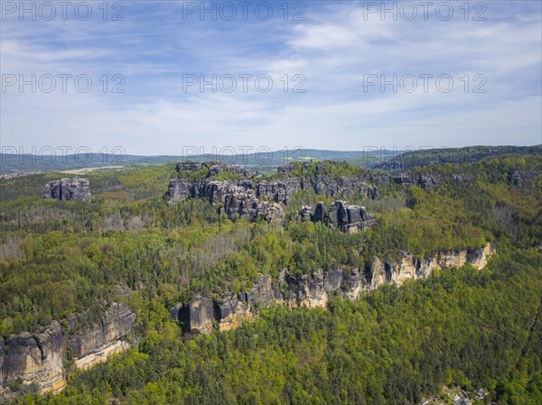 The Schrammsteine are an elongated, heavily jagged group of rocks in the Elbe Sandstone Mountains, located east of Bad Schandau in Saxon Switzerland, Reinhardtsdorf, Saxony, Germany, Europe
