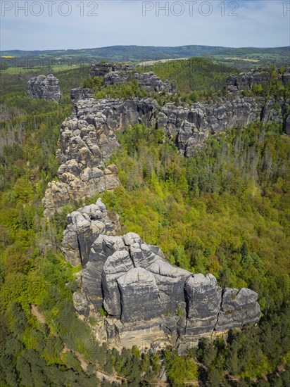 The Schrammsteine are an elongated, heavily jagged group of rocks in the Elbe Sandstone Mountains, located east of Bad Schandau in Saxon Switzerland, Reinhardtsdorf, Saxony, Germany, Europe