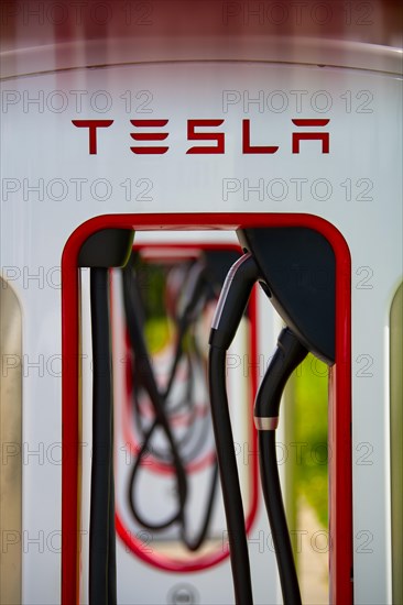Tesla Supercharger, Logo, Charging station for electric cars, Electric charging station, Charging column, E-filling station, E-mobility, Ulm, Baden-Wuerttemberg, Germany, Europe