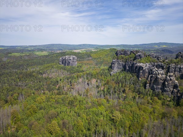 The Schrammsteine are an elongated, heavily jagged group of rocks in the Elbe Sandstone Mountains, located east of Bad Schandau in Saxon Switzerland, Reinhardtsdorf, Saxony, Germany, Europe