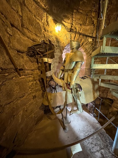 Inside of tower castle tower of castle from 13th century today castle hotel Trendelburg exhibited medieval knight armour and armour protection armour for horse of knight, Trendelburg, Weserbergland, Hesse, Germany, Europe