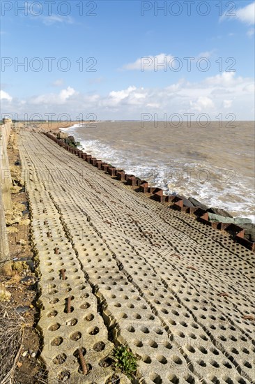 Coastal defences North Sea coast at East Lane, Bawdsey, Suffolk, England, UK sheet piling inclined stone surface drainage holes