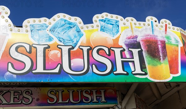 Sign for iced Slush at seaside food takeaway fast food business, Felixstowe, Suffolk, England, UK