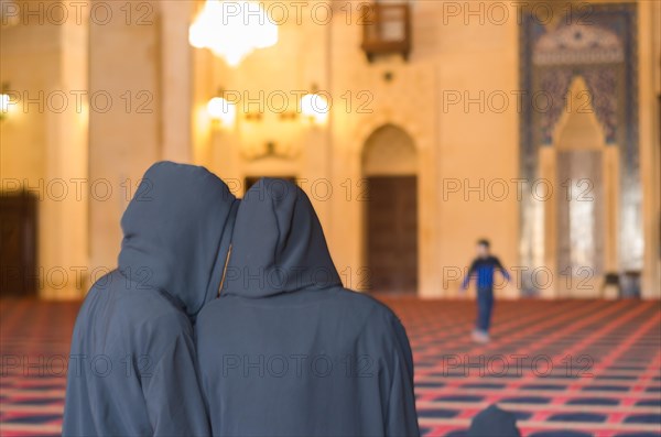 Beirut, Lebanon, April 03, 2017: Women praying inside the mosque of Mohammad Al-Amin Mosque in Beirut Lebanon, Asia