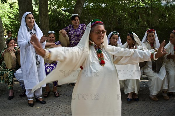 Pamiri woman performing a dance, roof of the world festival, Khorog, Tajikistan, Central Asia. All the women are nizari ismaili, Asia