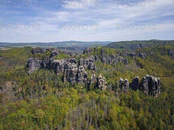 The Schrammsteine are an elongated, heavily jagged group of rocks in the Elbe Sandstone Mountains, located east of Bad Schandau in Saxon Switzerland, Reinhardtsdorf, Saxony, Germany, Europe