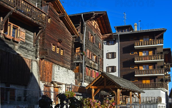 Multi-storey wooden dwellings in traditional and modern style, Heremence, Val d'Herens, Valais, Switzerland, Europe