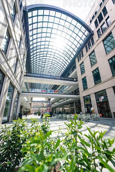 Modern shopping arcade under a large glass dome with inviting daylight, Mail of Berlin, Berlin, Germany, Europe
