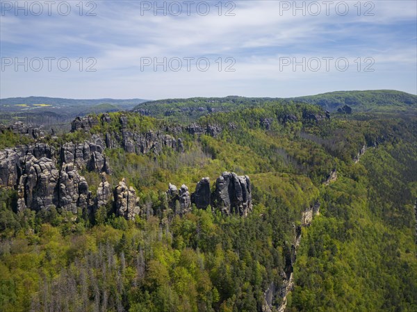 The Schrammsteine are an elongated, heavily jagged group of rocks in the Elbe Sandstone Mountains, located east of Bad Schandau in Saxon Switzerland, Reinhardtsdorf, Saxony, Germany, Europe