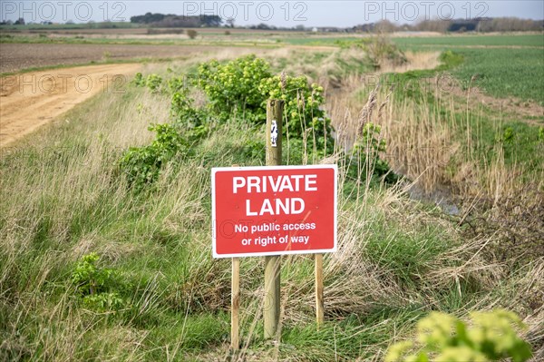 Private Land No public access or right of way sign, in countryside, Alderton, Suffolk, England, UK