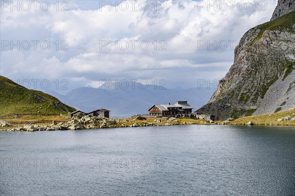 Obstanserseehuette mountain hut on the Obstansersee mountain lake, Carnic main ridge, Carnic High Trail, Carnic Alps, Carinthia, Austria, Europe