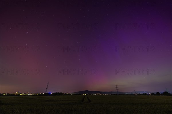 After several solar storms (solar flares), so-called auroras can be seen in the sky throughout Germany in the night between 10 May 2024 and 11 May 2024. The natural spectacle could be observed here in Hesse over the Taunus ridge, Frankfurt am Main, Hesse, Germany, Europe