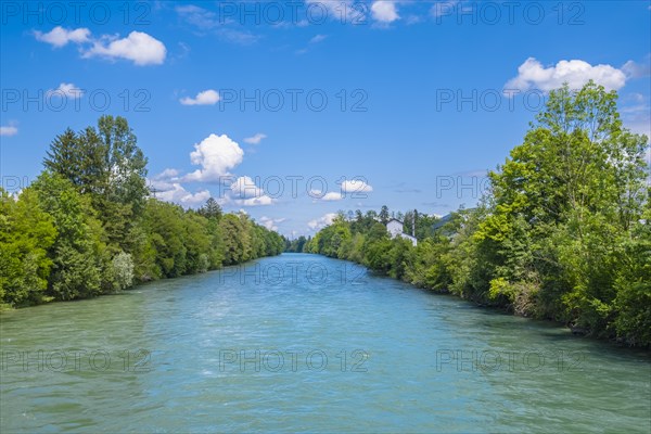 A calm river surrounded by green trees under a blue sky with fluffy clouds, Emmen, Lucerne, Switzerland, Europe