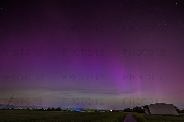 After several solar storms (solar flares), so-called auroras can be seen in the sky throughout Germany in the night between 10 May 2024 and 11 May 2024. The natural spectacle could be observed here in Hesse over the Taunus ridge, Frankfurt am Main, Hesse, Germany, Europe