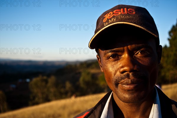 Malagasy christian man, Jesus is my boss cap, man from the Betsileo ethnic group, Madagascar, Africa