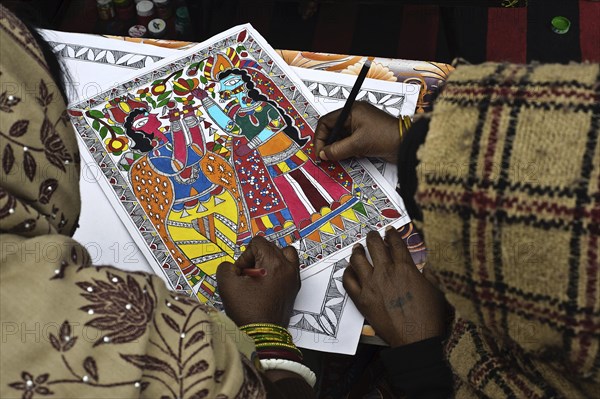 Women taking drawing lessons in a drawing school, learning the Madhubani style of painting, Bihar, India, Asia