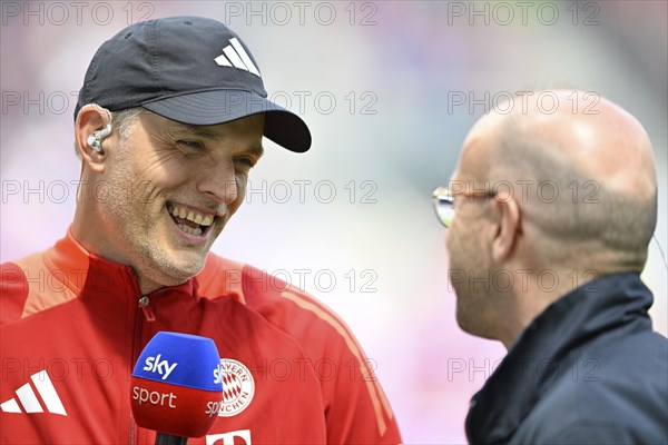 Coach Thomas Tuchel FC Bayern Munich FCB portrait, in interview, microphone, mike, logo, smiles, SKY presenter Patrick Wasserziehr, PreZero Arena, Sinsheim, Baden-Wuerttemberg, Germany, Europe