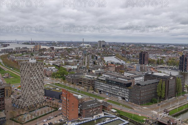 Aerial view of a city with modern and old buildings along a river, hustle and bustle, view from above of a modern city with skyscrapers, bridges and a harbour, Rotterdam, netherlands