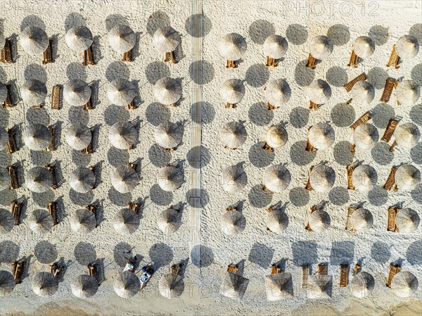 Top Down over Umbrellas and Beach in Himare from a drone, Albanian Riviera, Albania, Europe