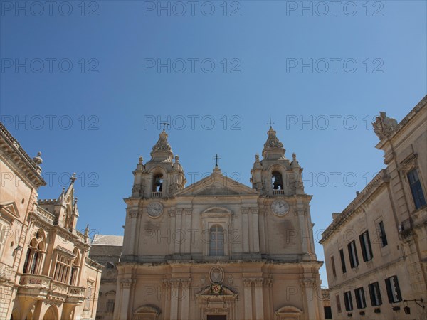 Historic buildings with a large church in the centre and two bell towers, the town of mdina on the island of malta with historic houses, colourful balconies, magnificent churches, mdina, Malta, Europe