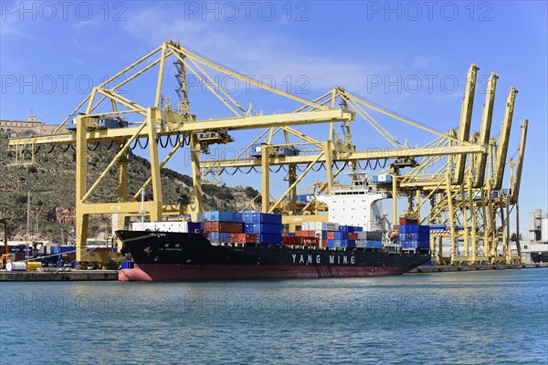 Container port and ships, Barcelona, Spain, Europe, Large cranes and loaded container ship in the harbour area, Catalonia, Europe
