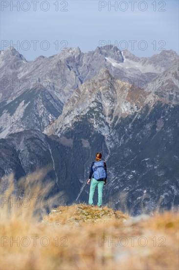 Mountaineer in the mountains in autumn, Venet crossing, Oetztal Alps, Tyrol, Austria, Europe