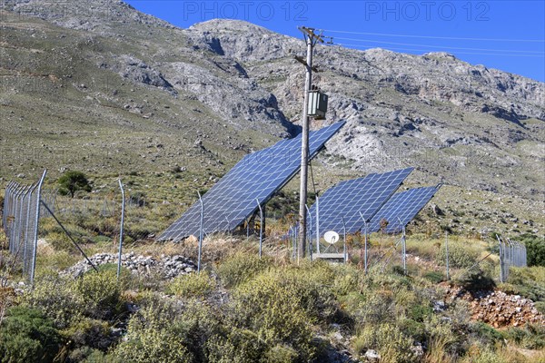 Large thermal solar system Solar collectors align themselves with the position of the sun Sun rays, Crete, Greece, Europe