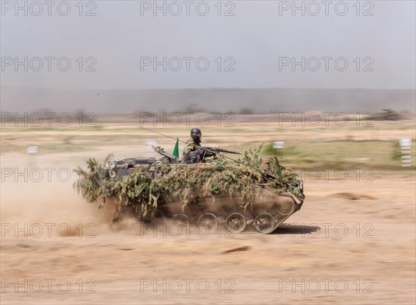 A German soldier on an M113 armoured transport vehicle, photographed during the NATO Steadfast Defender large-scale manoeuvre in Pabrade, 29.05.2024
