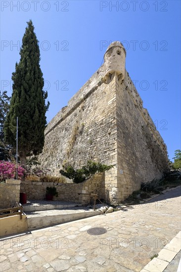 One of ten 10 round watchtowers on southern east side of ruins of historical fortress Fortetza Fortezza of Rethymno built by Republic of Venice in 16th century in northwest of old town of Rethymno on hill Paleokastro on north coast of island Crete with view to Aegean Cretan Mediterranean, Rethymno, Crete, Greece, Europe
