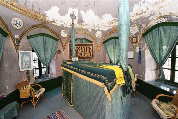 Mausoleum, prayer room with cloth-covered tomb, religious symbols and furnished with chairs and carpets, Rhodes Old Town, Rhodes Town, Rhodes, Dodecanese, Greek Islands, Greece, Europe