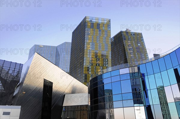 Las Vegas, Nevada, USA, North America, Several modern buildings with glass facades and reflections under a clear sky in an urban environment, Las Vegas Strip, North America