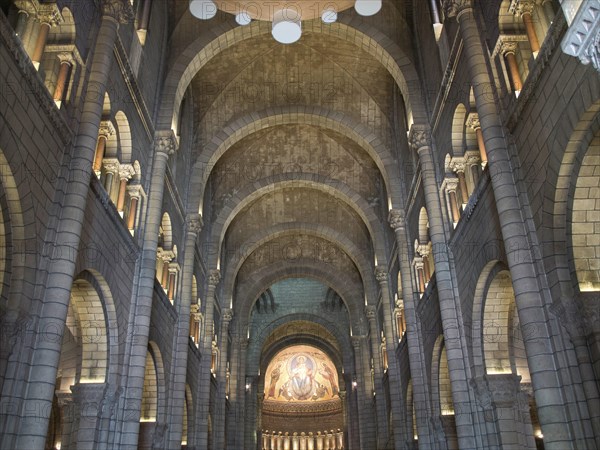 Impressive church interior with stone arches, vaults and ceiling mosaic, Monte Carlo, Monaco, Europe