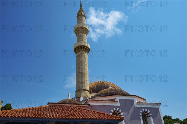 Suleiman Mosque, minaret and dome under blue sky with few clouds, red roofs and historical architecture, Rhodes Old Town, Rhodes Town, Rhodes, Dodecanese, Greek Islands, Greece, Europe
