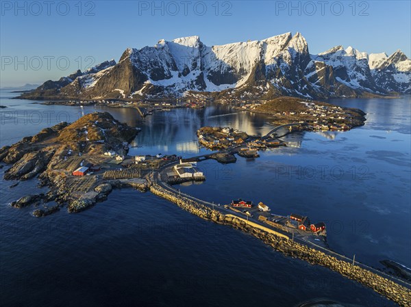 Aerial view, bridge, village, steep mountains, coast, winter, morning light, Reine, Moskenesoya, Lofoten, Norway, Europe