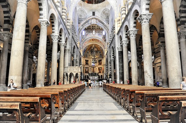 Interior, Cathedral of Santa Maria Assunta, Pisa, Tuscany, Italy, Europe, Interior of a Gothic church with long benches and detailed architecture, Europe