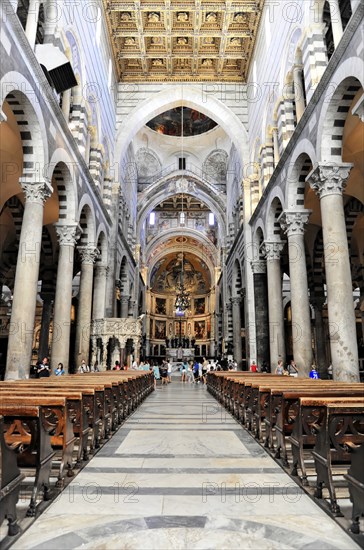 Interior view, Cathedral of Santa Maria Assunta, Pisa, Tuscany, Italy, Europe, Interior view of a Gothic church with high columns, benches and detailed ceiling patterns, Europe