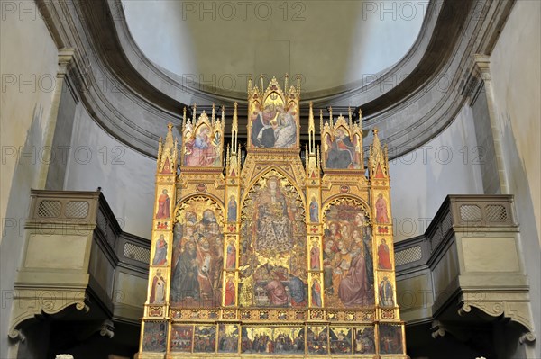 Montepulciano, Tuscany, Italy, Europe, A richly decorated altar with numerous images of saints and works of art in a church, Tuscany, Europe Italy, Europe