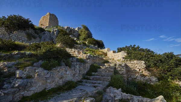 Remains of a castle on a hill with stone steps and vegetation under a clear sky, Kritinia Castle, St John's Castle, Kritinia, Rhodes, Dodecanese, Greek Islands, Greece, Europe