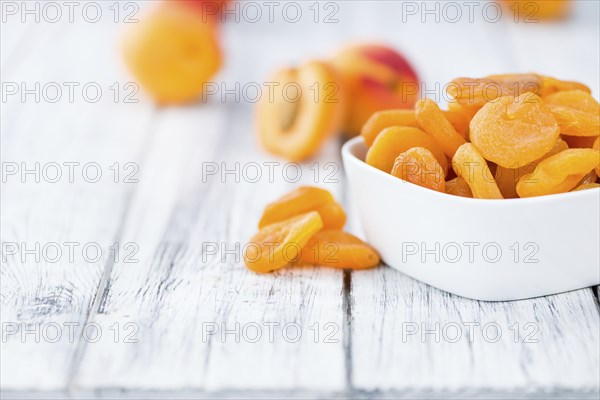 Portion of fresh Dried Apricots (close-up shot, selective focus)