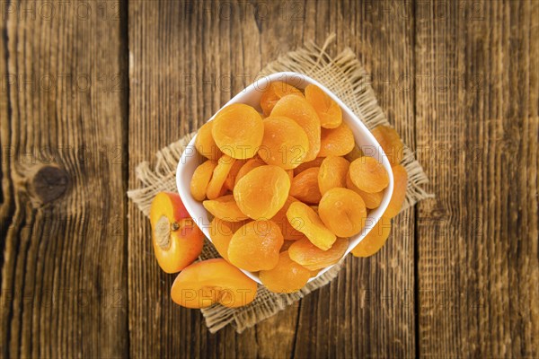 Portion of fresh Dried Apricots (close-up shot, selective focus)