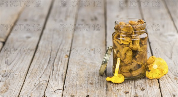 Portion of fresh Canned chanterelles close-up shot, selective focus